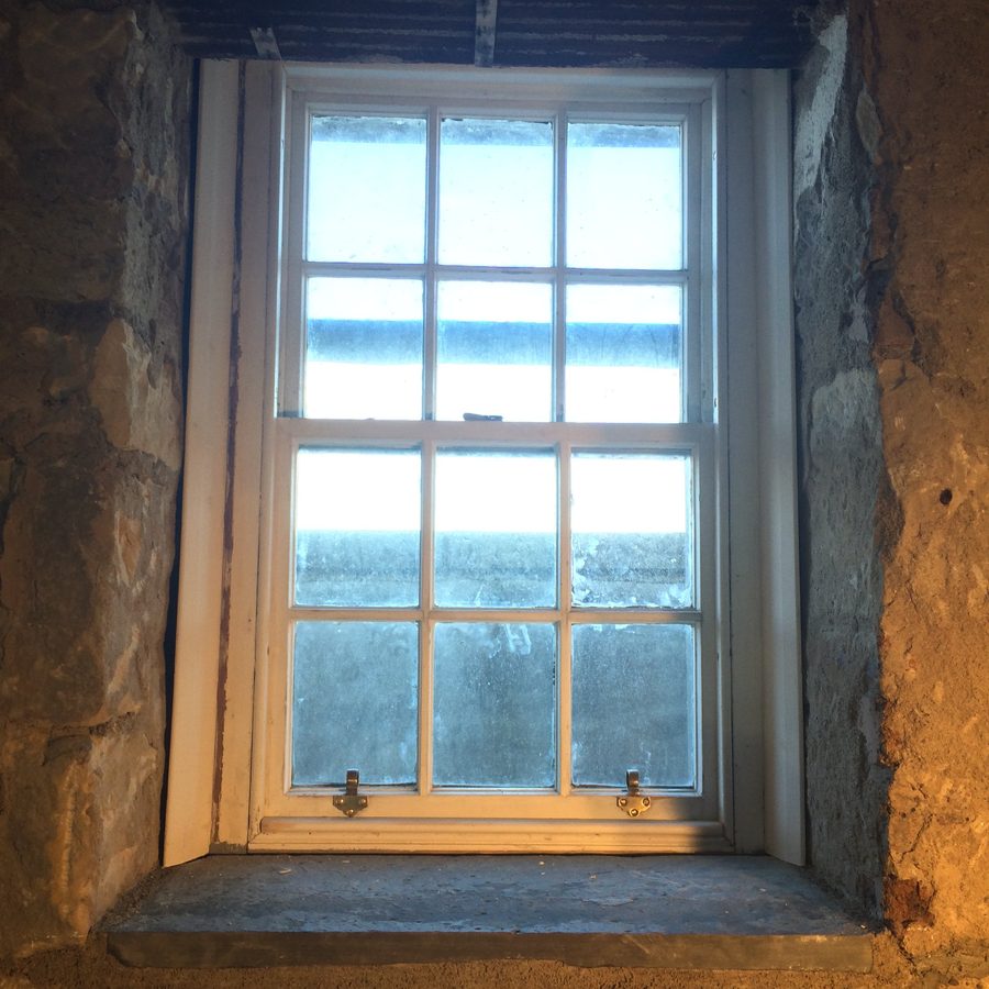 Sash window reinstalled in its reveal