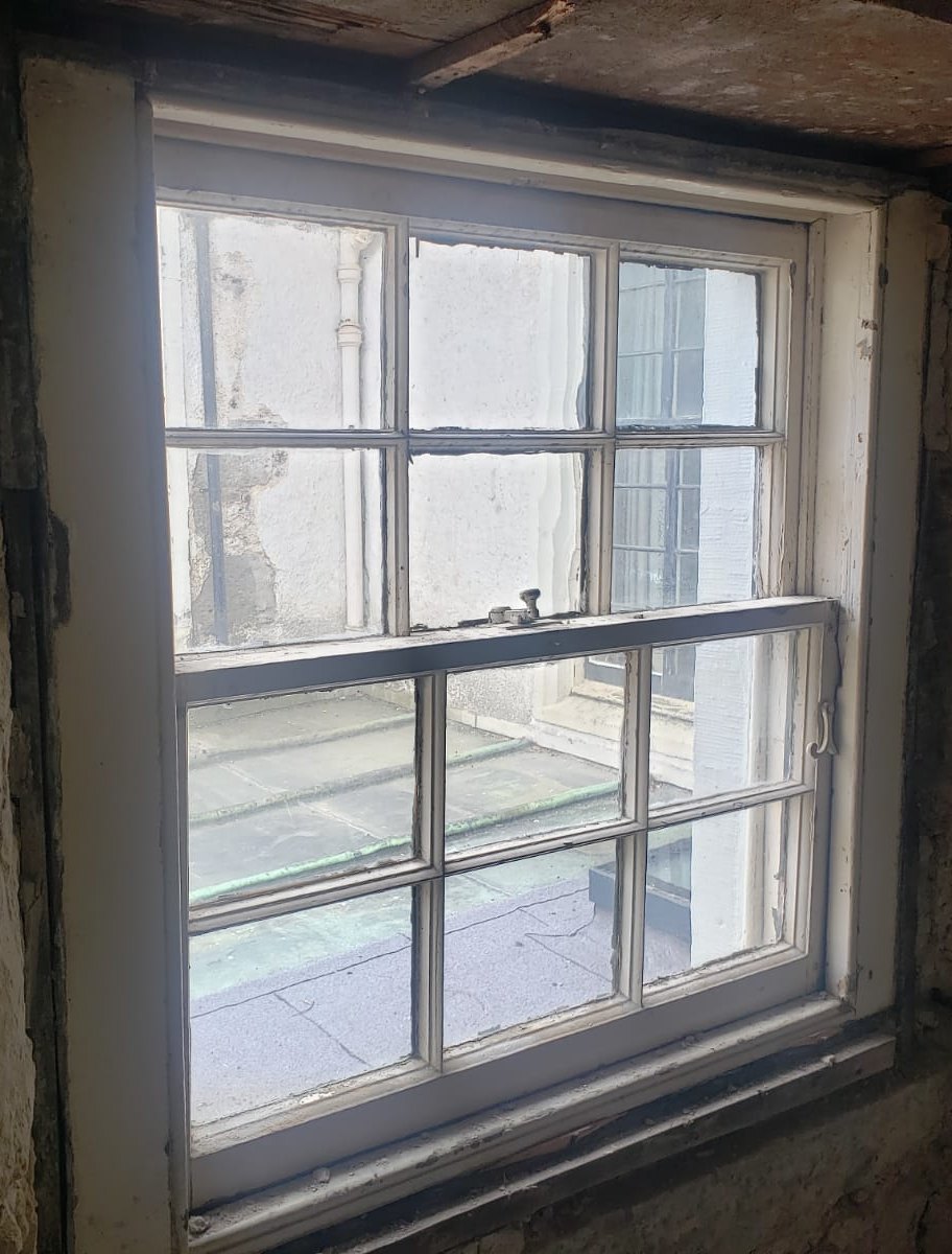Historic window before treatment