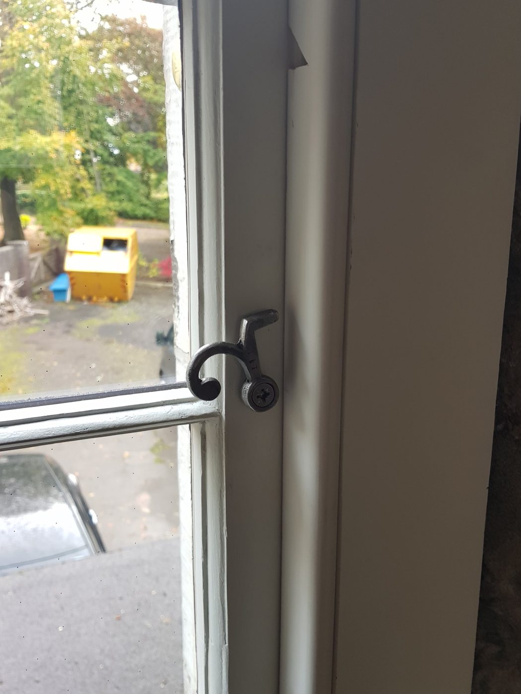 Iron fastener on a restored window