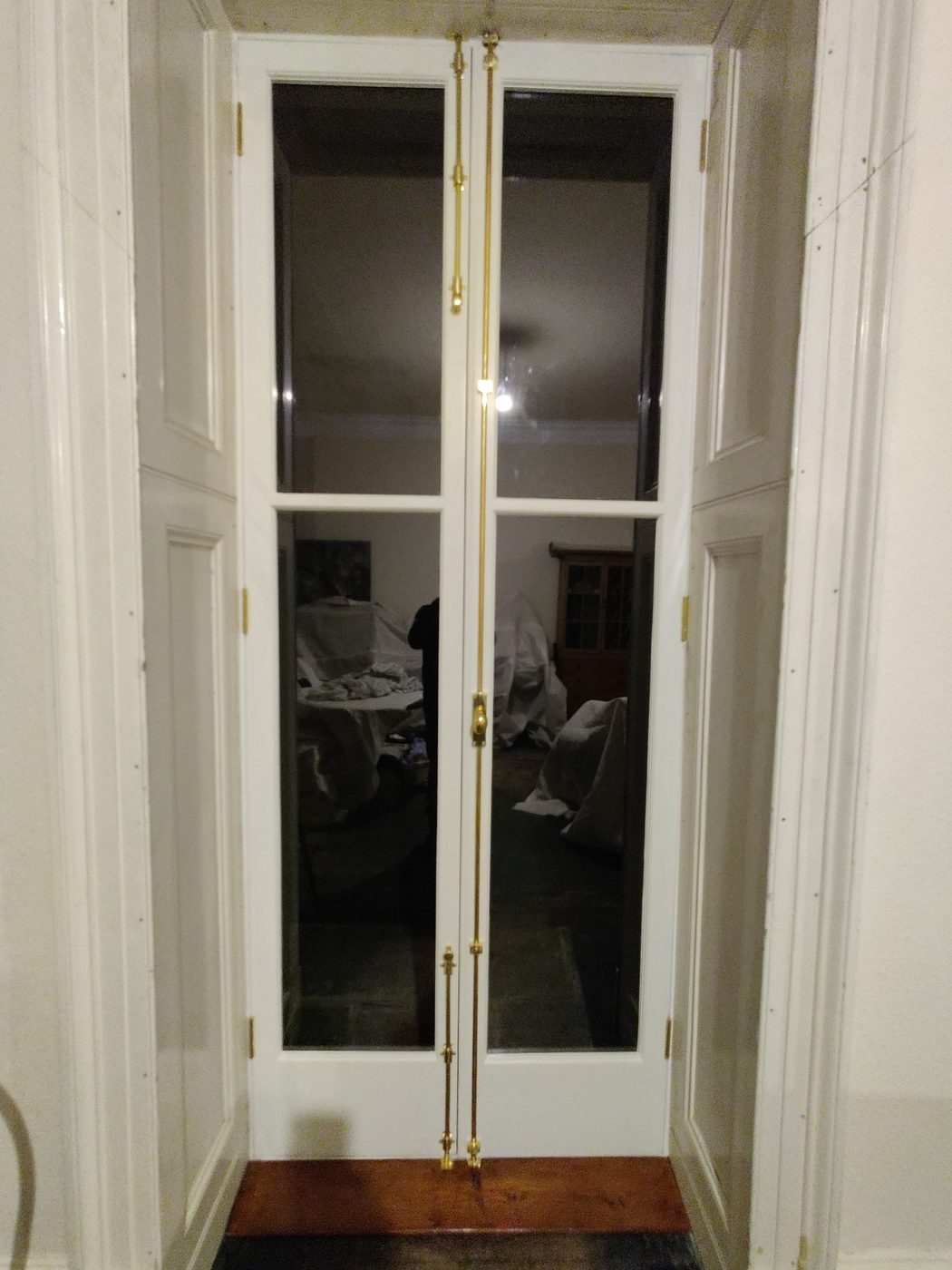 Pair of restored casement doors with brass cremorne bolts