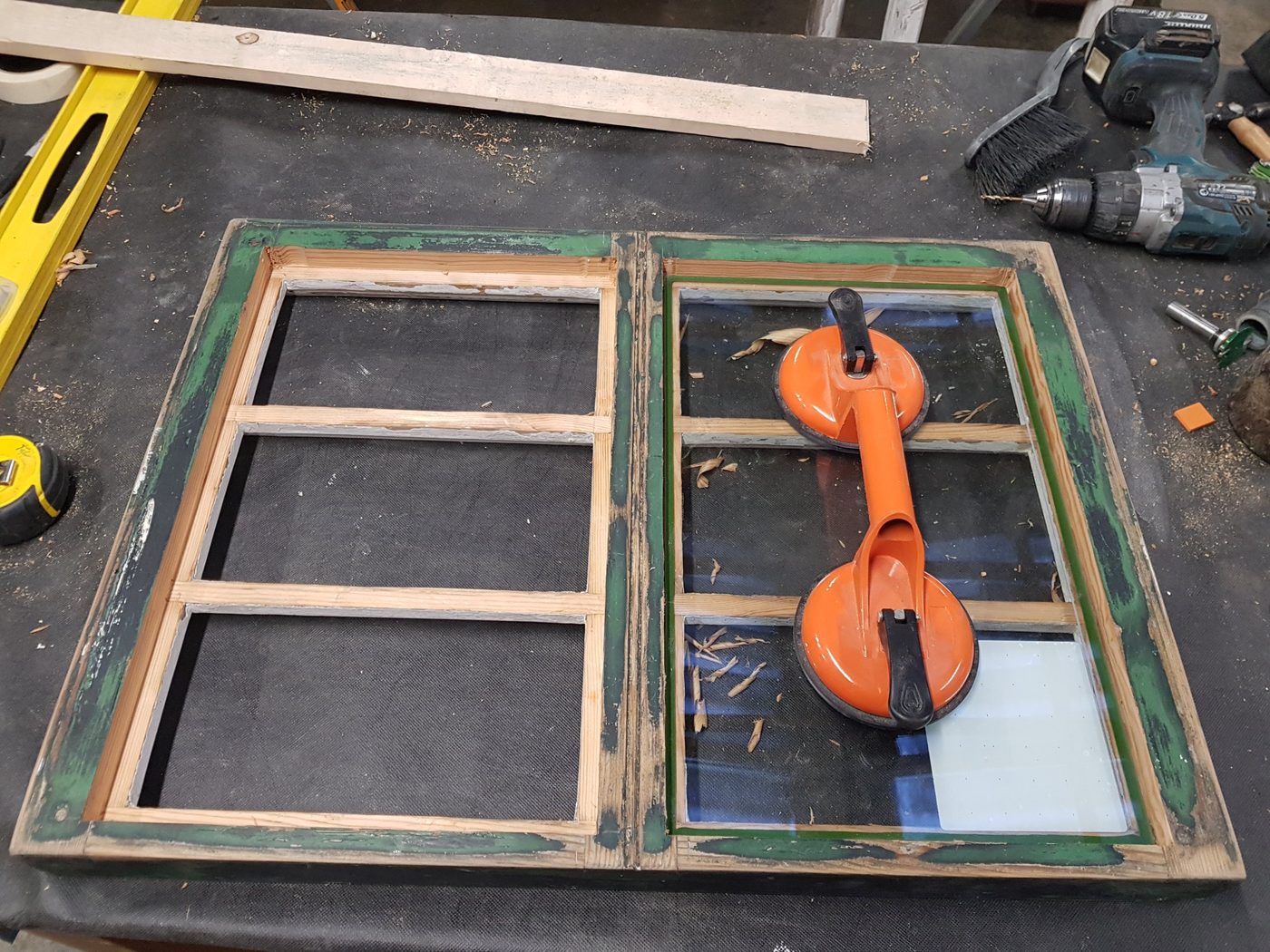 FINEO vacuum glazing being fitted into a restored casement