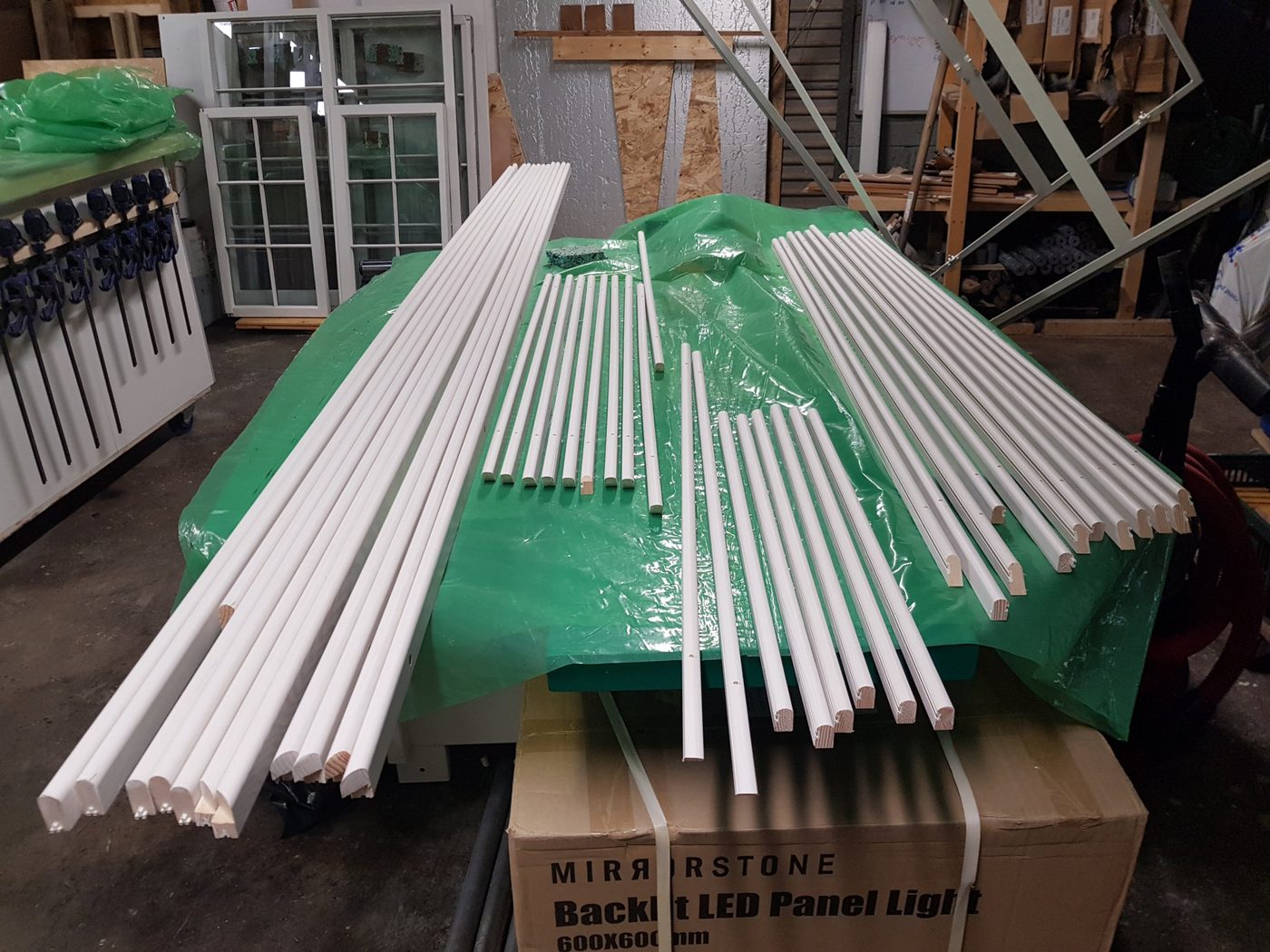 New glazing bars and mouldings, primed and ready for assembly