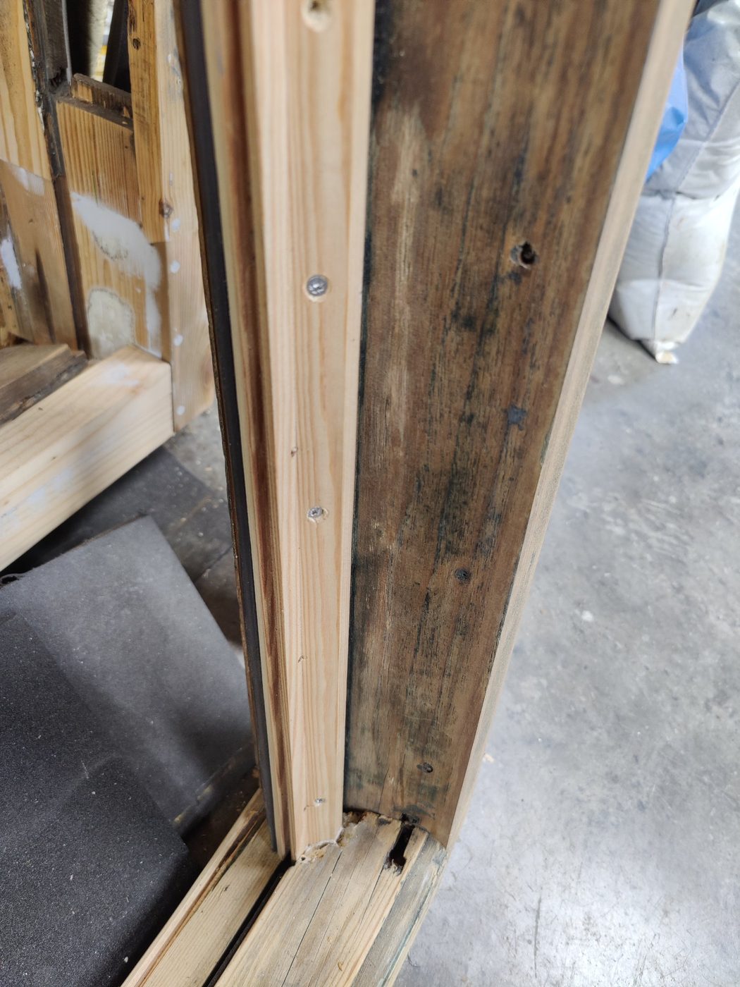 Casement frame with new timber repairs and draught-proofing seal